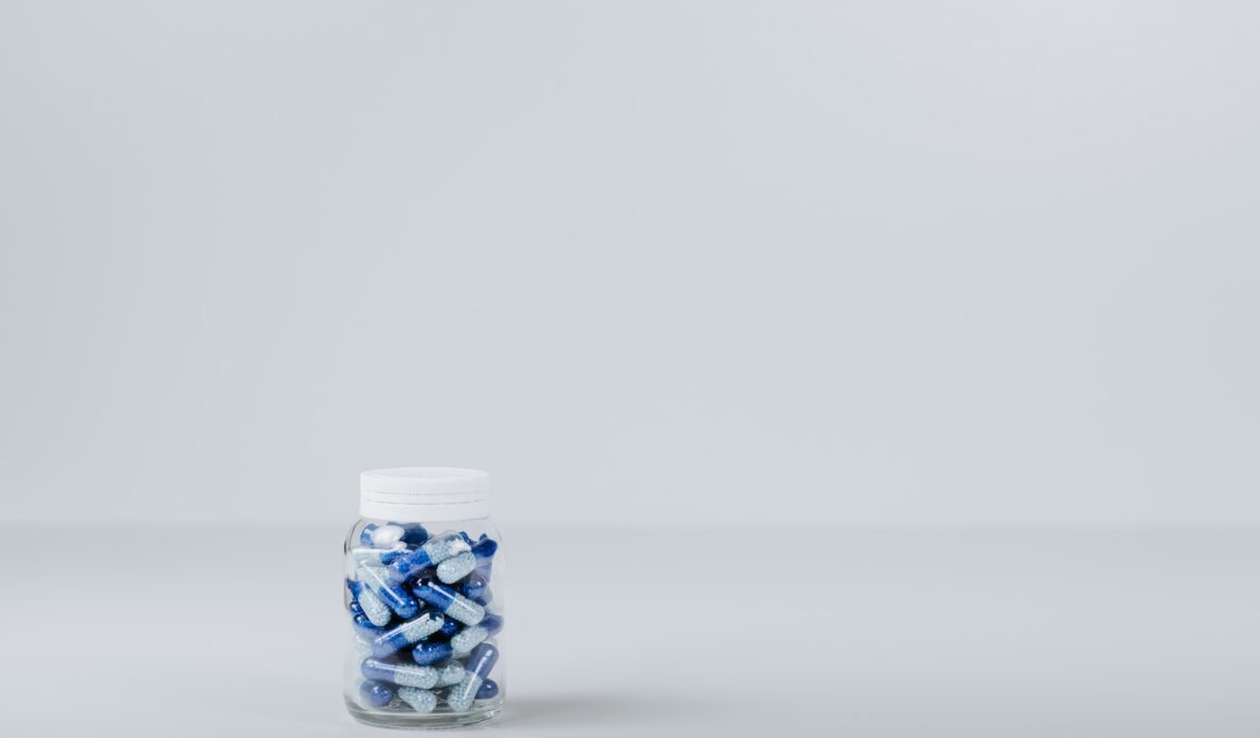 blue and white tablet in container