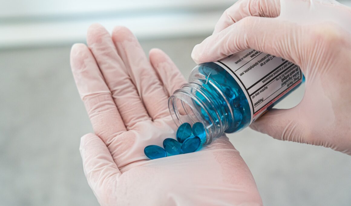 Person Wearing Latex Gloves Holding a Bottle of Blue Pills