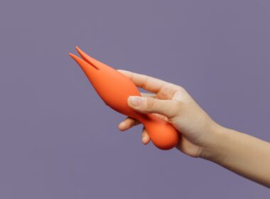 Close-Up Shot of a Person Holding an Adult Toy