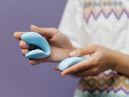 Close-Up Shot of a Person Holding Adult Toys