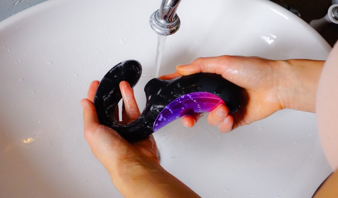 A Person Holding a Sex Toy