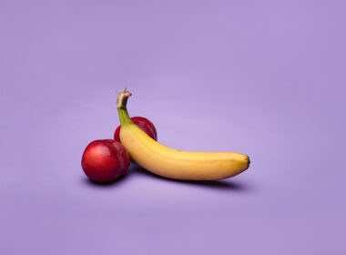 yellow banana fruit beside red apple fruit